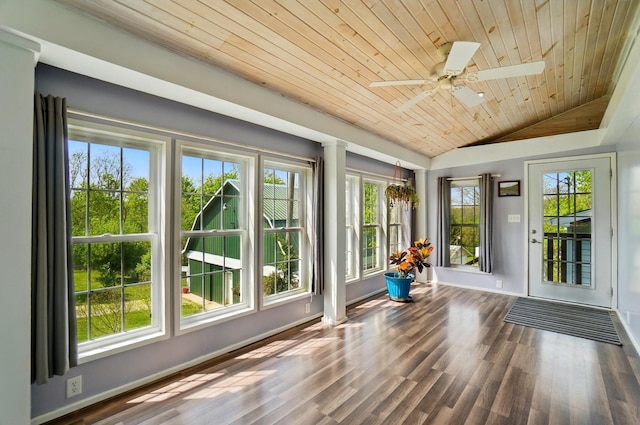 unfurnished sunroom with baseboards, lofted ceiling, a wealth of natural light, and wooden ceiling