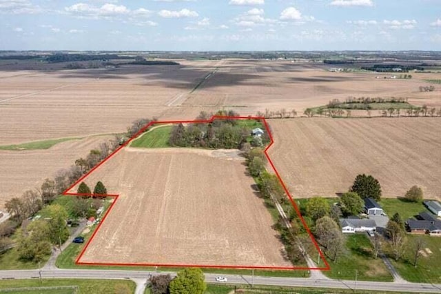 birds eye view of property featuring a rural view