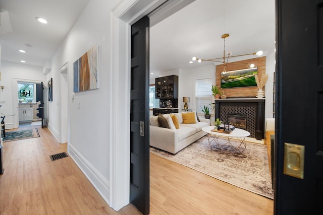 618 Berkeley Rd, Columbus, OH 43205 - hall featuring wood finished floors, baseboards, and recessed lighting