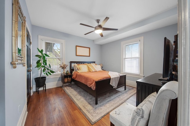618 Berkeley Rd, Columbus, OH 43205 - bedroom featuring baseboards, wood finished floors, and multiple windows