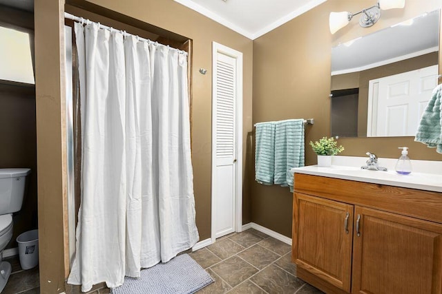 full bathroom with crown molding, vanity, toilet, marble finish floor, and curtained shower