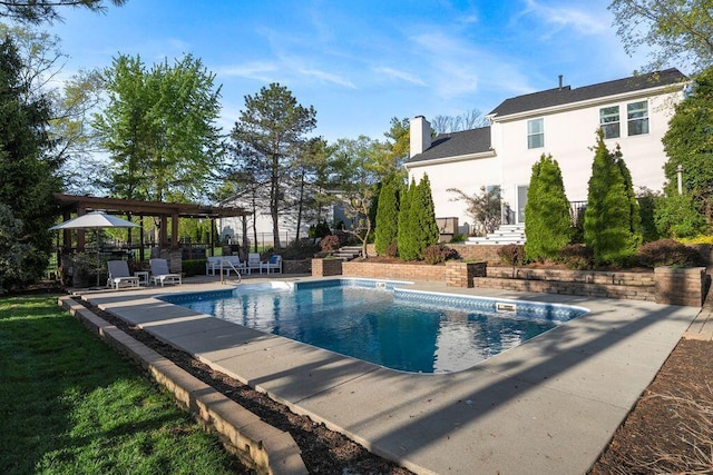 outdoor pool featuring a gazebo and a patio area