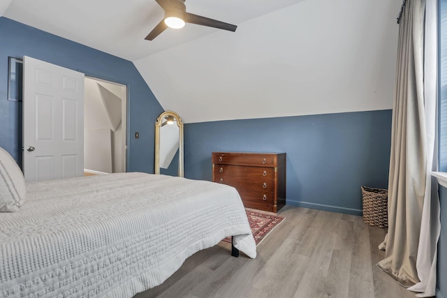 603 S James Rd, Columbus, OH 43213 - bedroom featuring a ceiling fan, baseboards, vaulted ceiling, and wood finished floors