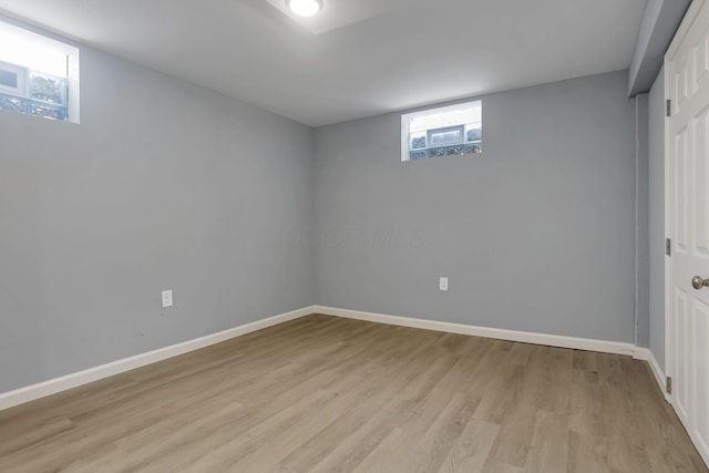 603 S James Rd, Columbus, OH 43213 - basement with baseboards and light wood-type flooring