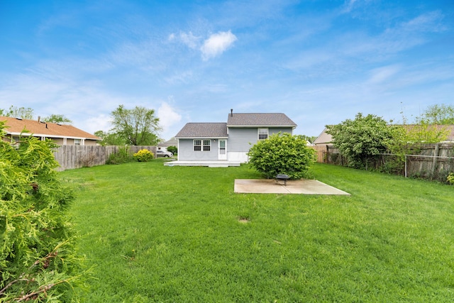 rear view of property with a patio area