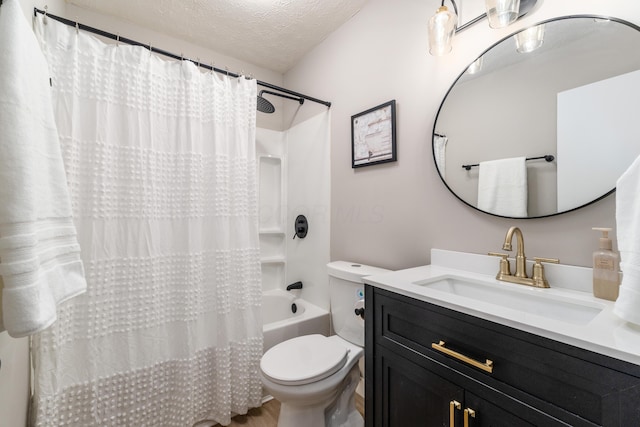 bathroom featuring toilet, a textured ceiling, vanity, shower / tub combo, and wood finished floors