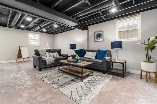 living area with carpet floors and baseboards