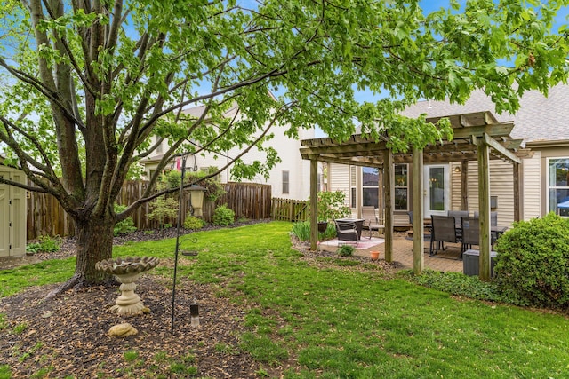 view of yard featuring a fenced backyard, a pergola, and a patio