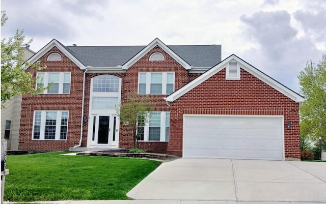 view of front facade featuring brick siding, a garage, a front lawn, and concrete driveway