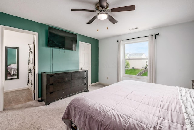 bedroom featuring baseboards, carpet, a ceiling fan, and visible vents