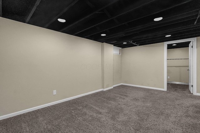 5968 Lisa St, Columbus, OH 43231 - finished basement with dark colored carpet, baseboards, and recessed lighting