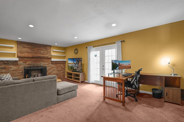 5968 Lisa St, Columbus, OH 43231 - living room featuring a desk, carpet, a fireplace, recessed lighting, and baseboards