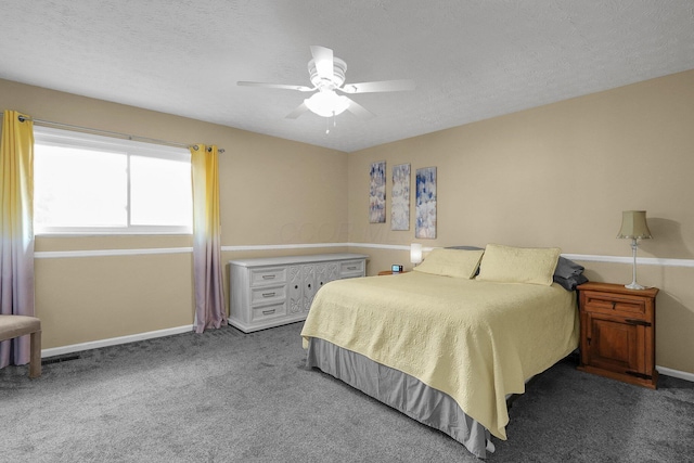 5968 Lisa St, Columbus, OH 43231 - carpeted bedroom with baseboards, a textured ceiling, and a ceiling fan