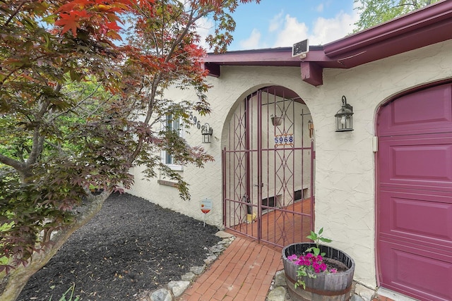 5968 Lisa St, Columbus, OH 43231 - doorway to property featuring stucco siding