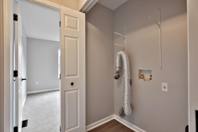 clothes washing area with laundry area, hookup for a washing machine, baseboards, and hookup for an electric dryer