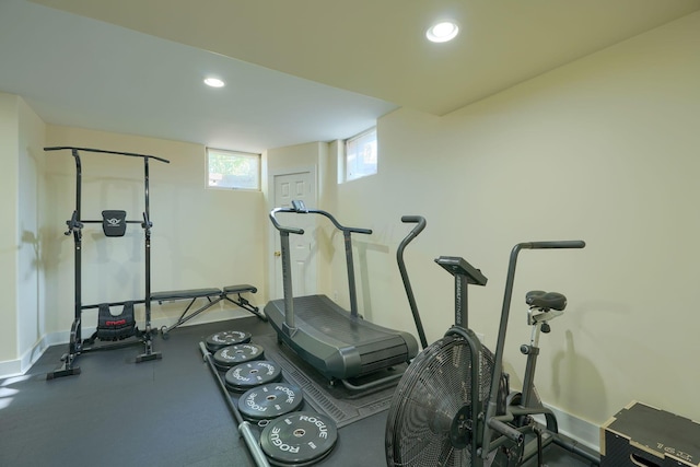 workout room with baseboards and recessed lighting