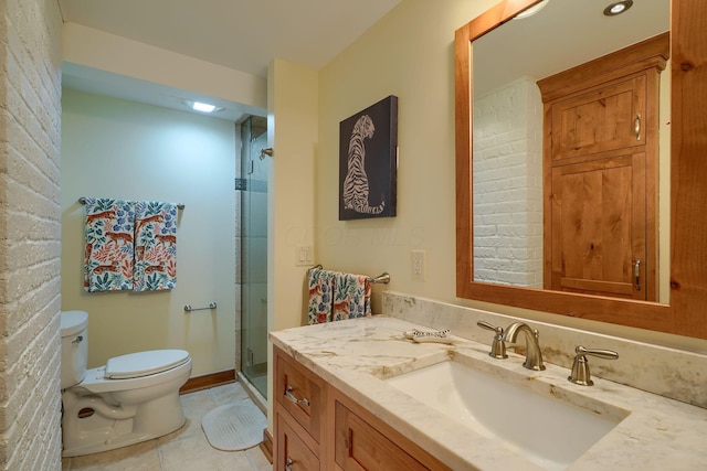 full bath featuring vanity, toilet, tile patterned flooring, and a stall shower