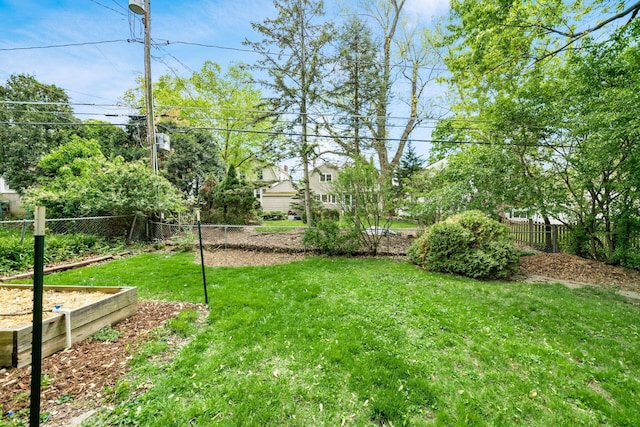 view of yard with fence