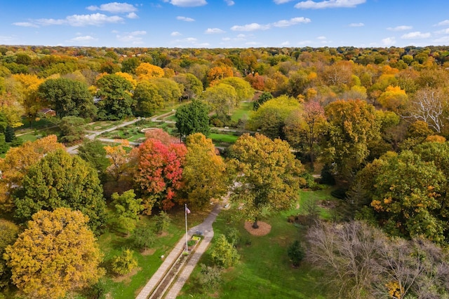 bird's eye view featuring a forest view