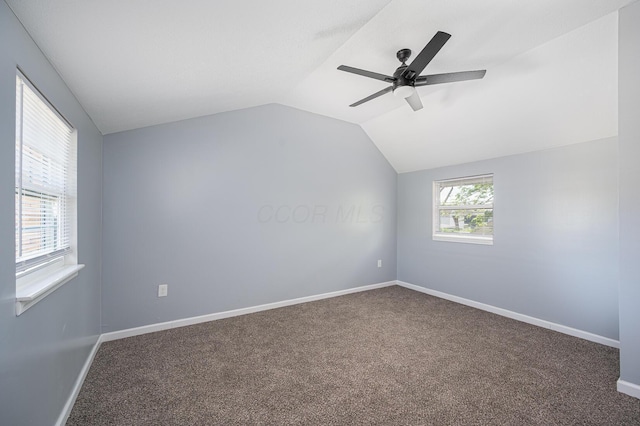 331 E Barthman Ave, Columbus, OH 43207 - empty room with carpet floors, ceiling fan, baseboards, and lofted ceiling