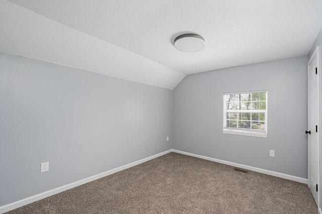 331 E Barthman Ave, Columbus, OH 43207 - bonus room with carpet floors, baseboards, vaulted ceiling, and visible vents