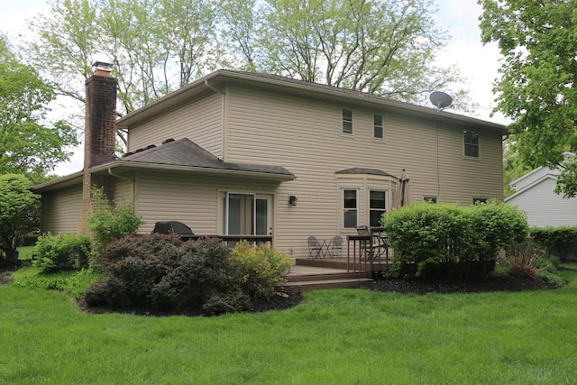 10160 Wellington Dr, Pickerington, OH 43147 - back of house with a lawn, a chimney, and a deck
