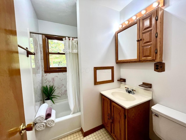 full bathroom featuring vanity, tile patterned floors, shower / bath combo, and toilet