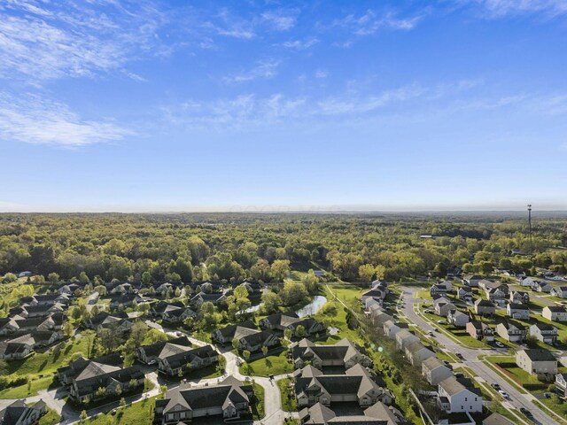 bird's eye view with a forest view and a residential view