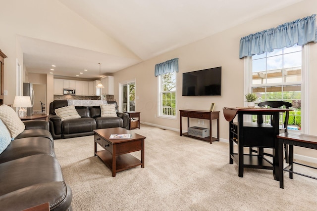 living room with baseboards, light carpet, vaulted ceiling, and recessed lighting