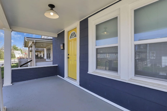 doorway to property with covered porch