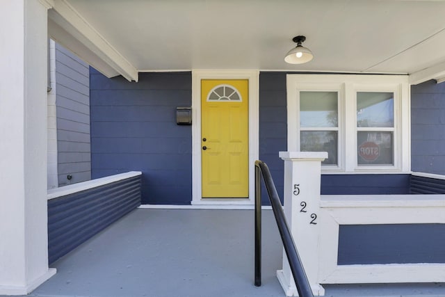 entrance to property with covered porch