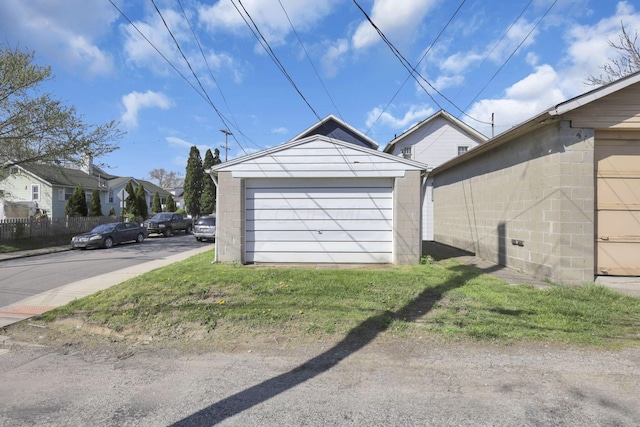 detached garage with a residential view