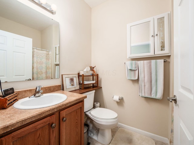 full bath with tile patterned flooring, vanity, toilet, a shower with shower curtain, and baseboards