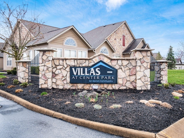view of community sign