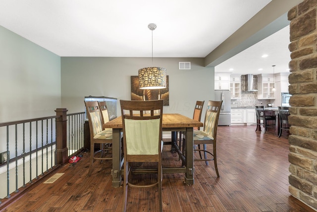 dining area with visible vents, recessed lighting, and dark wood-style flooring