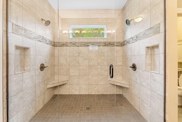 full bath featuring a stall shower