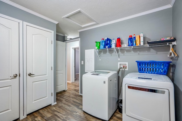 24796 E Fork Rd, Laurelville, OH 43135 - laundry area featuring ornamental molding, attic access, wood finished floors, and washing machine and clothes dryer