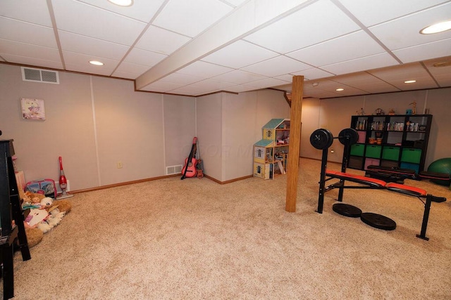 recreation room featuring carpet flooring, recessed lighting, visible vents, and a paneled ceiling