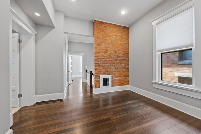 884 Neil Ave, Columbus, OH 43215 - unfurnished living room featuring dark wood-type flooring and recessed lighting