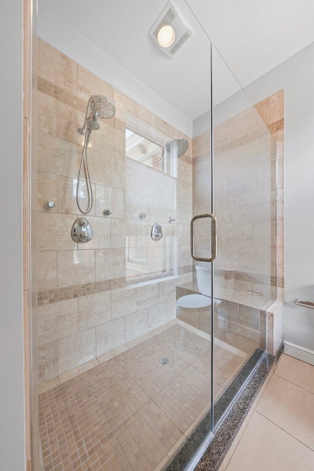 884 Neil Ave, Columbus, OH 43215 - bathroom with a shower stall and tile patterned flooring