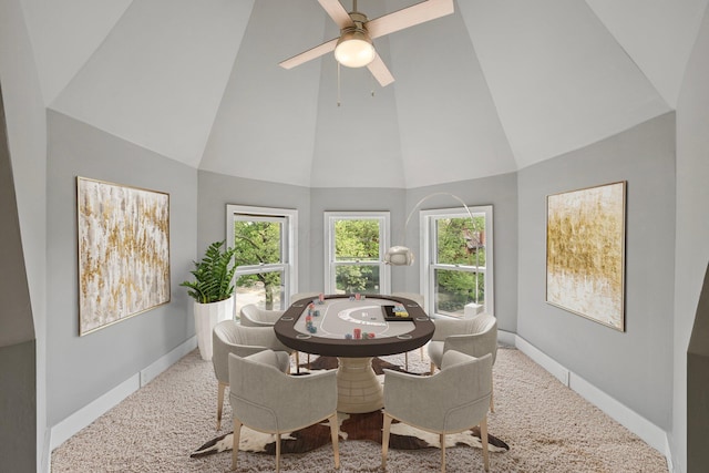 884 Neil Ave, Columbus, OH 43215 - carpeted dining area featuring high vaulted ceiling and a ceiling fan
