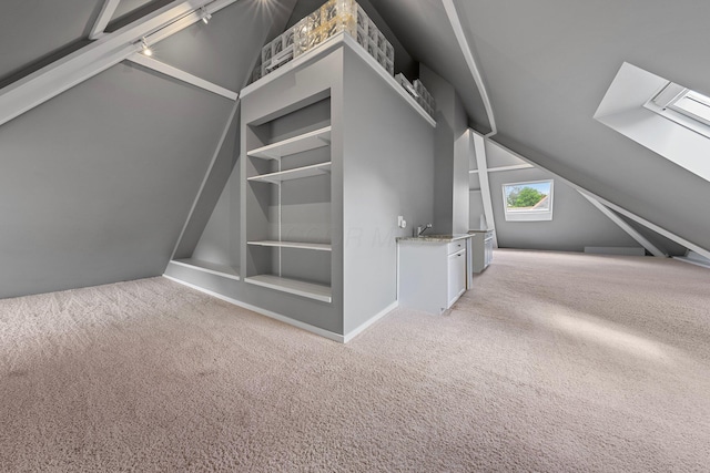 884 Neil Ave, Columbus, OH 43215 - bonus room featuring lofted ceiling, light colored carpet, and built in features