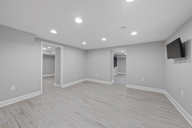 884 Neil Ave, Columbus, OH 43215 - finished below grade area with light wood-type flooring and recessed lighting