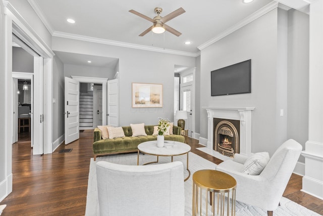 884 Neil Ave, Columbus, OH 43215 - living room featuring ceiling fan, crown molding, dark wood-style floors, a fireplace with flush hearth, and recessed lighting