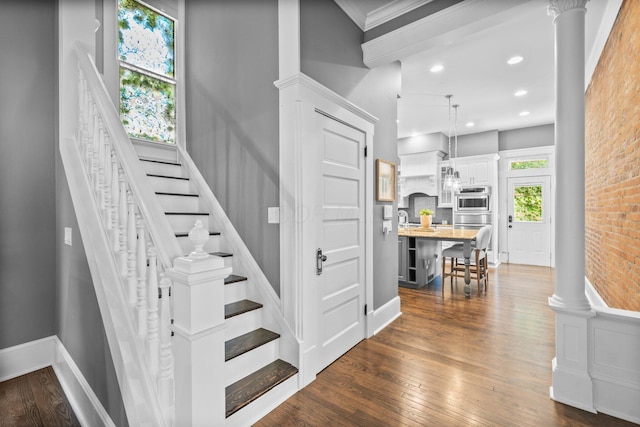884 Neil Ave, Columbus, OH 43215 - stairs with wood finished floors and recessed lighting