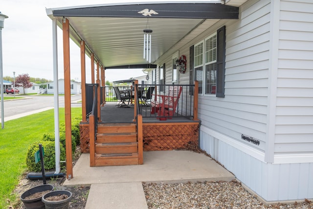 view of patio / terrace with covered porch and outdoor dining area
