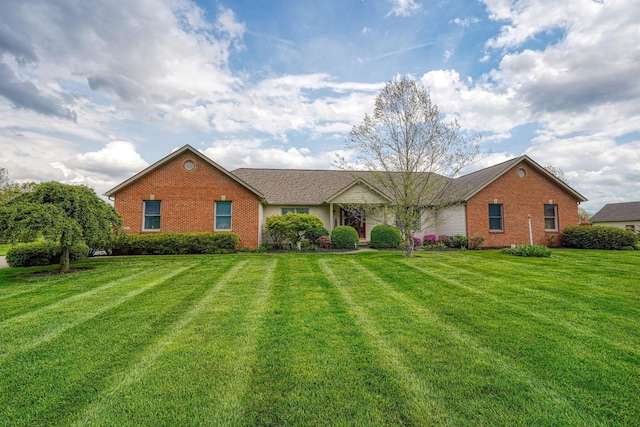 4656 Meadowgrove Dr NW, Carroll, OH 43112 - ranch-style home featuring brick siding and a front yard
