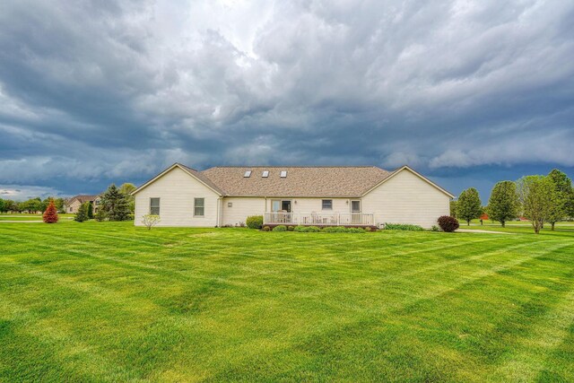 4656 Meadowgrove Dr NW, Carroll, OH 43112 - rear view of property with a deck and a yard