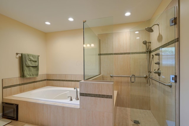 4656 Meadowgrove Dr NW, Carroll, OH 43112 - bathroom with a garden tub, a stall shower, and recessed lighting
