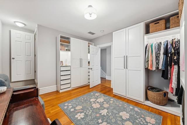 walk in closet with visible vents and light wood-style flooring